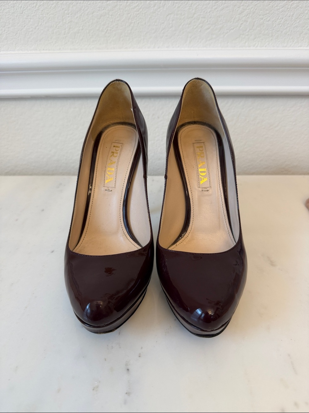 Prada Patent Leather Pumps in Deep Burgundy
